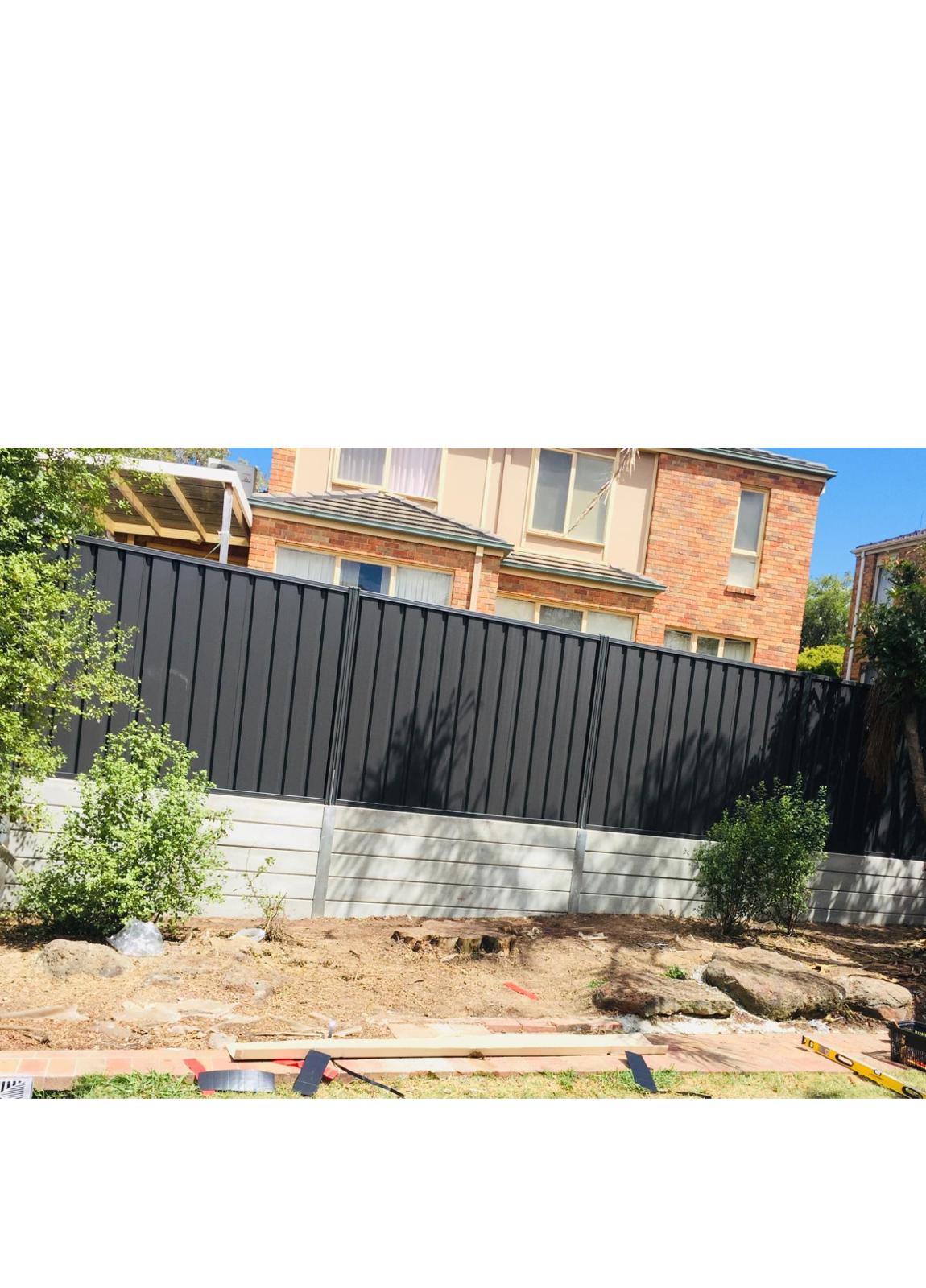 Colorbond fence on retaining wall built by WeldTech Creations in Melbourne